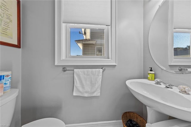 bathroom with sink and toilet