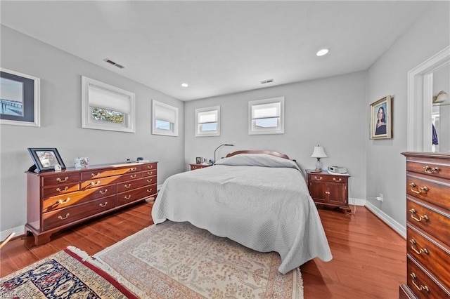 bedroom featuring dark wood-type flooring