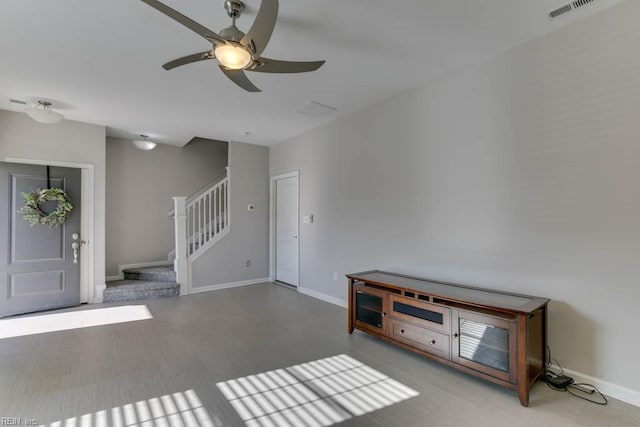 interior space featuring ceiling fan