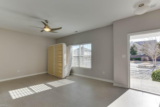 spare room featuring ceiling fan