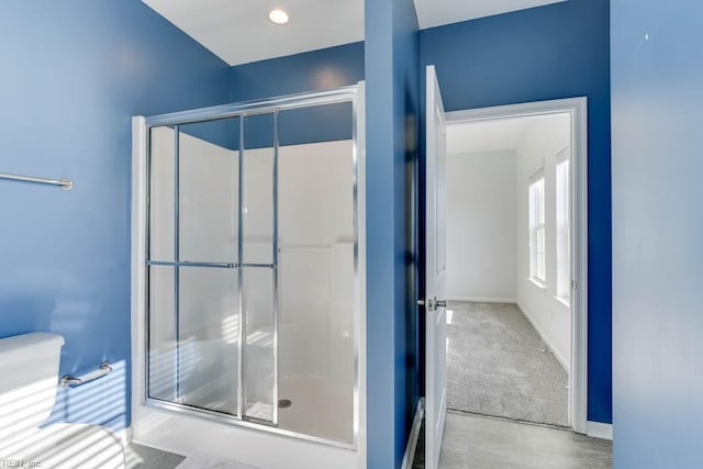 bathroom featuring walk in shower