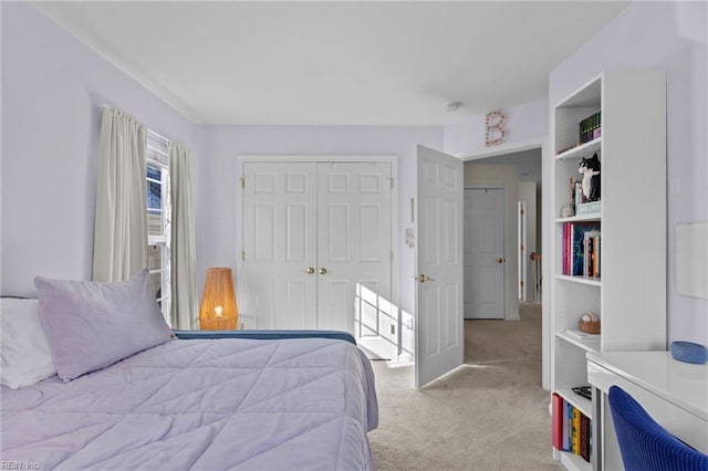 carpeted bedroom featuring a closet