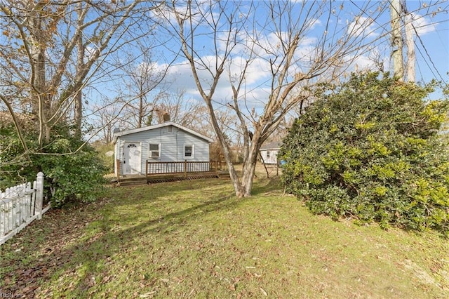 view of yard with a wooden deck