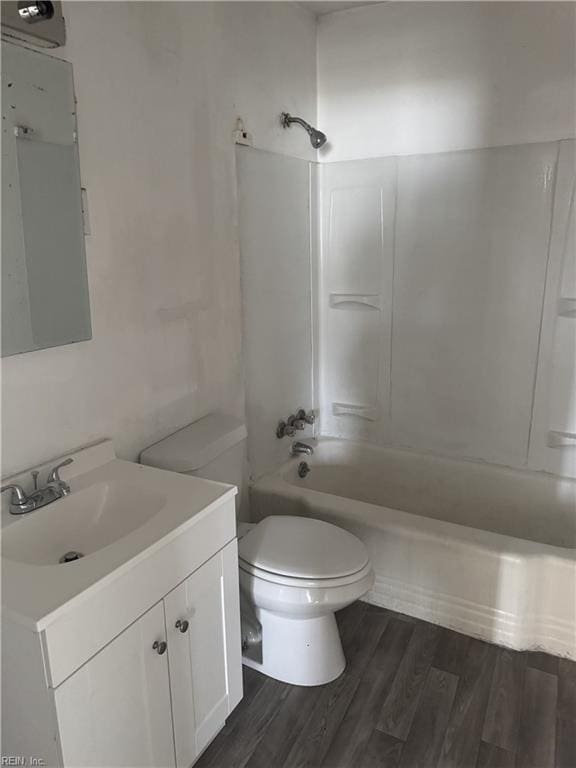 409 Hicks Ave, Norfolk, VA 23502 - bathroom with toilet,  shower combination, wood finished floors, and vanity