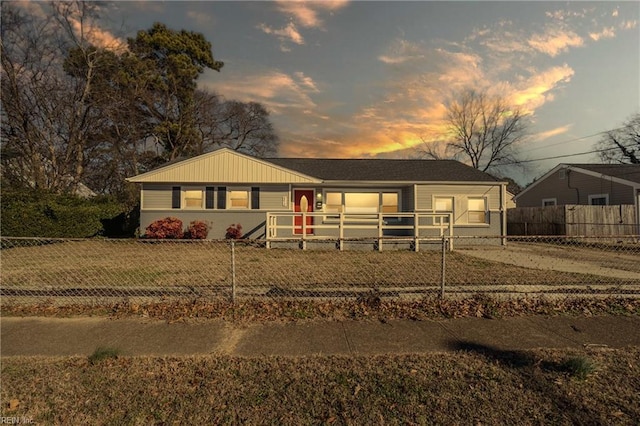 single story home with a yard