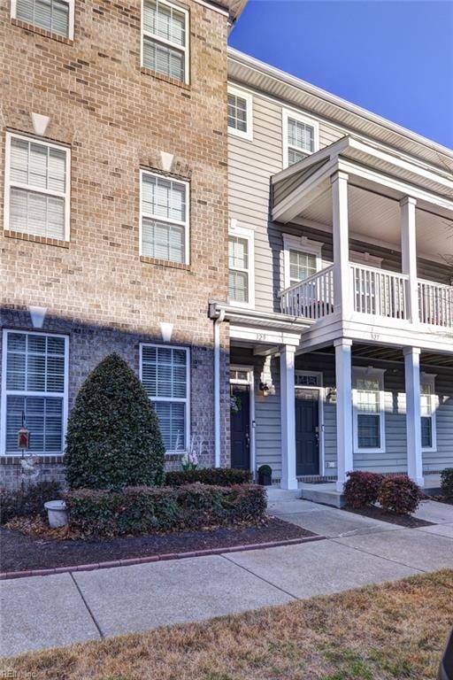 view of property with a balcony