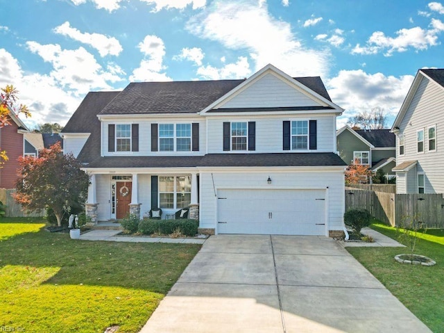 view of front facade featuring a front yard and a garage