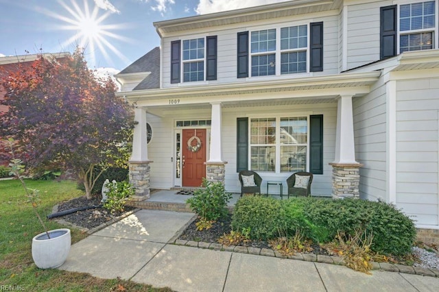 property entrance with a porch