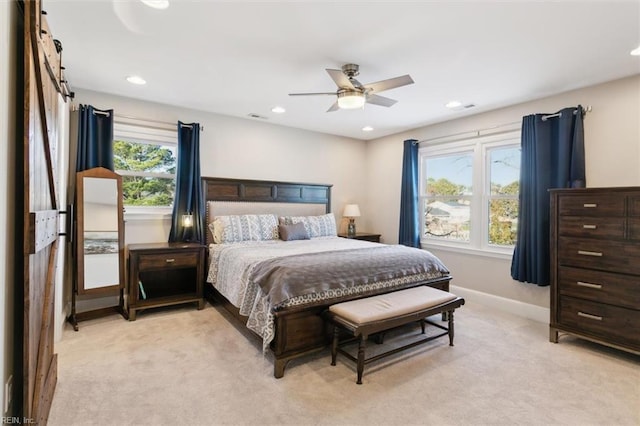 carpeted bedroom featuring ceiling fan