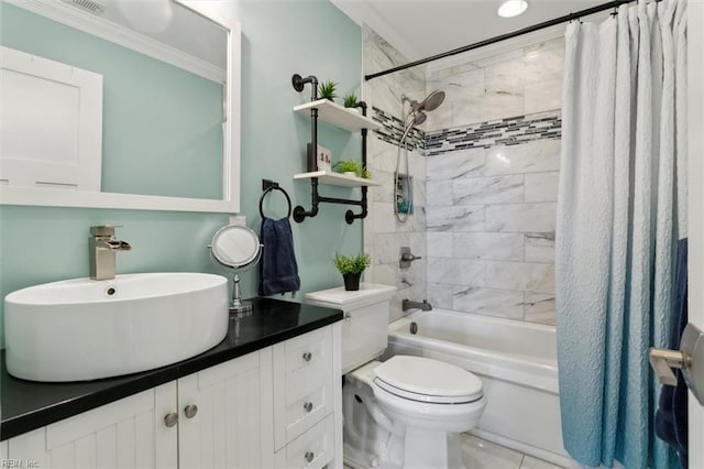 full bathroom with shower / bath combo with shower curtain, vanity, ornamental molding, and toilet