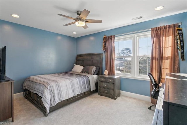 carpeted bedroom featuring ceiling fan