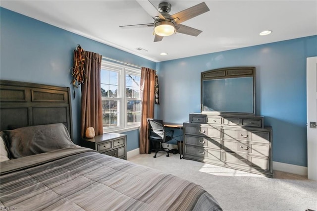 bedroom featuring light colored carpet and ceiling fan