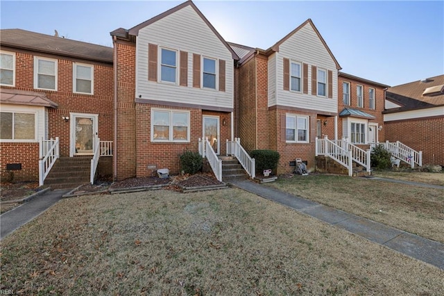 view of property featuring a front yard