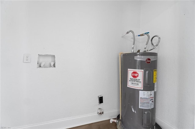 utility room featuring water heater