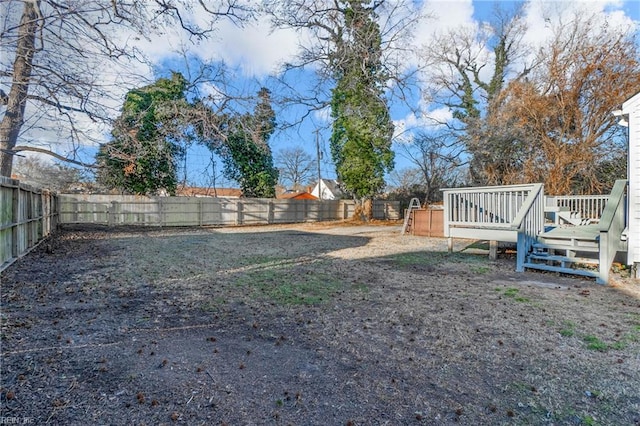 view of yard with a deck