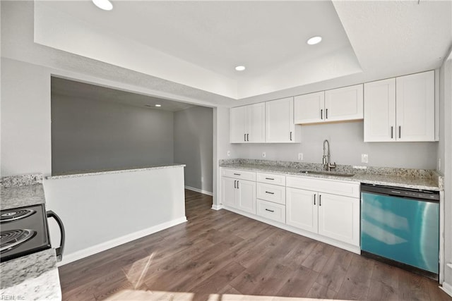 kitchen featuring dishwasher, sink, dark hardwood / wood-style floors, a tray ceiling, and white cabinets