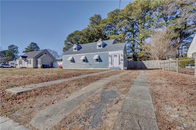 view of new england style home