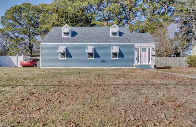 view of front of home with a front lawn