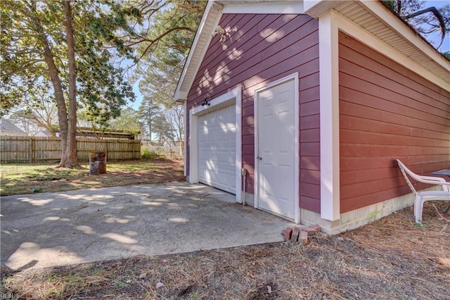 view of outbuilding featuring a garage