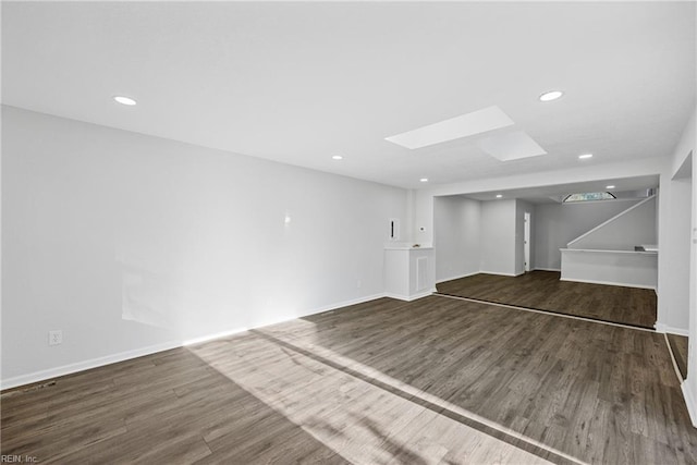 basement featuring dark wood-type flooring