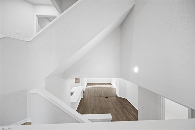 staircase featuring hardwood / wood-style floors