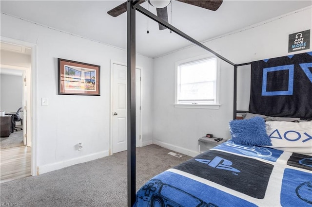 bedroom featuring ceiling fan and carpet floors