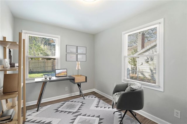 office area with hardwood / wood-style flooring