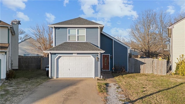 front facade with a front yard and a garage