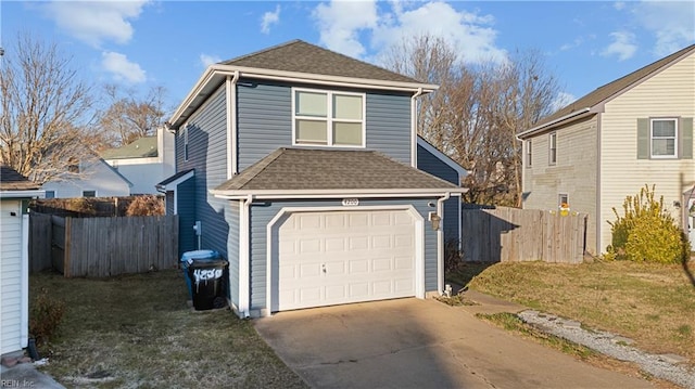 exterior space with a yard and a garage