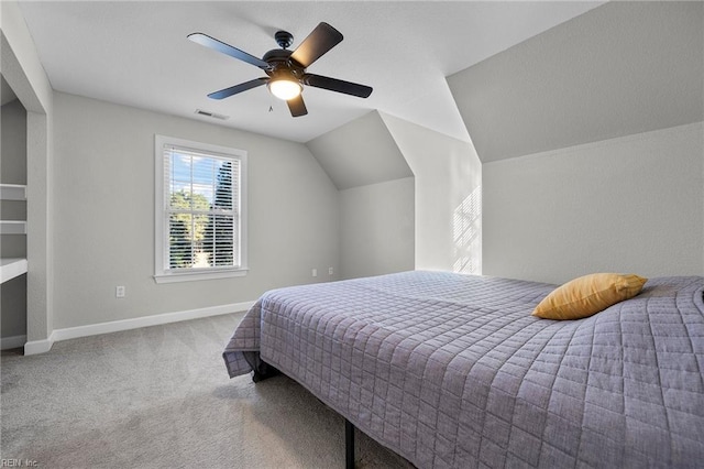 bedroom featuring carpet floors, ceiling fan, and lofted ceiling