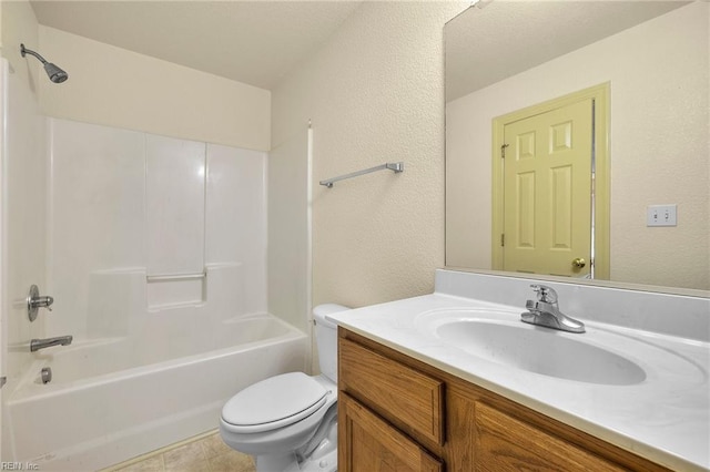 full bathroom featuring bathtub / shower combination, vanity, and toilet