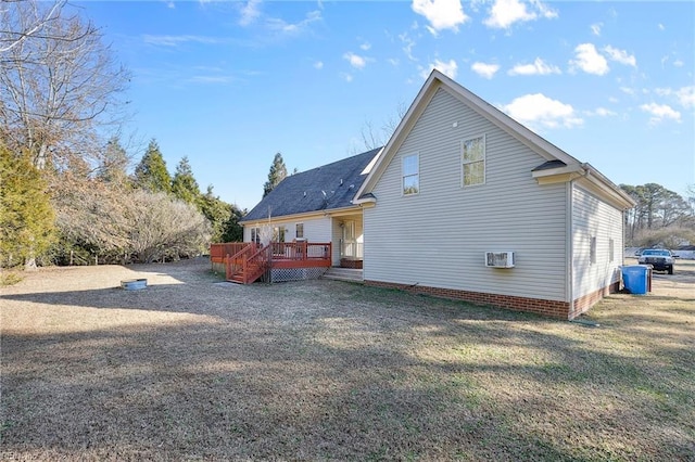 rear view of property with a deck