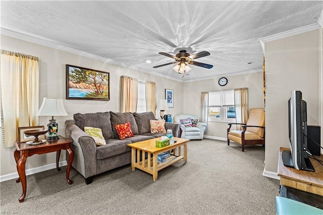 living room featuring carpet flooring, ceiling fan, ornamental molding, and a textured ceiling