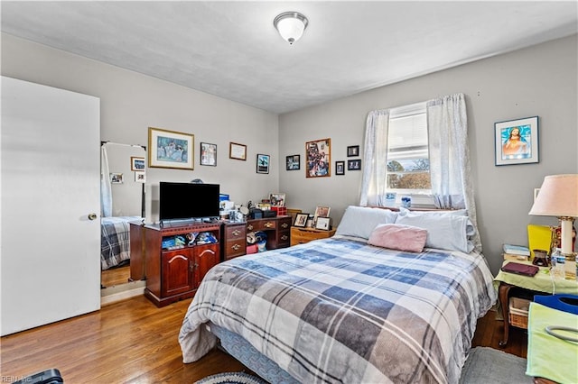 bedroom featuring light wood-type flooring