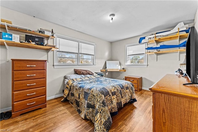 bedroom featuring light wood-type flooring