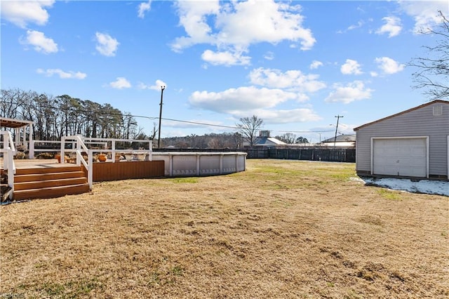 view of yard featuring a swimming pool side deck