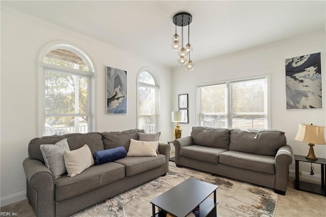 living room with light carpet and plenty of natural light