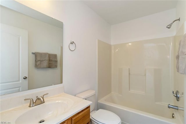 full bathroom with vanity, shower / bathtub combination, and toilet