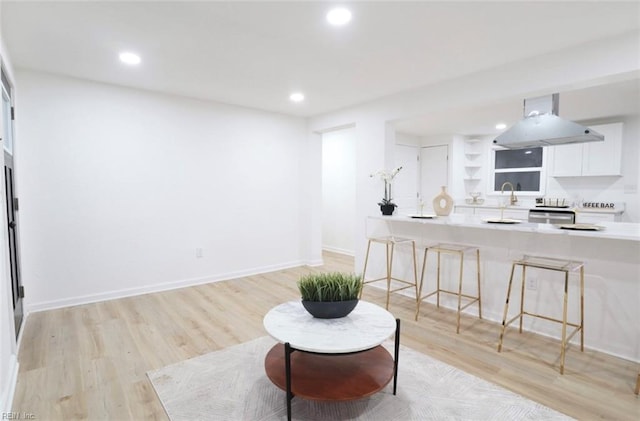 living area featuring light wood-type flooring