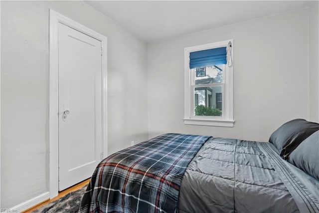 bedroom featuring hardwood / wood-style flooring