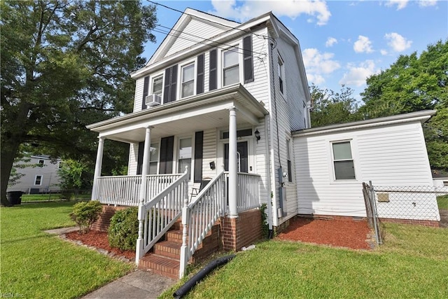 view of front of home featuring a porch and a front lawn