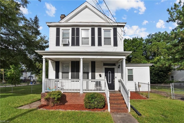 view of front of home with cooling unit and a front lawn