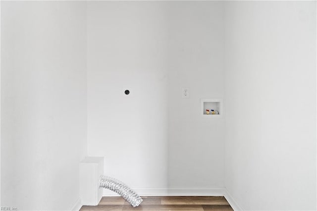 clothes washing area featuring electric dryer hookup, hookup for a washing machine, and wood-type flooring