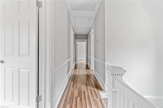 hallway featuring hardwood / wood-style flooring