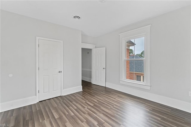 unfurnished bedroom featuring wood-type flooring