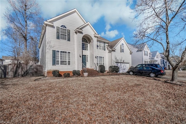 view of front of property featuring a garage