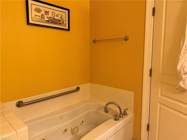 bathroom featuring a washtub