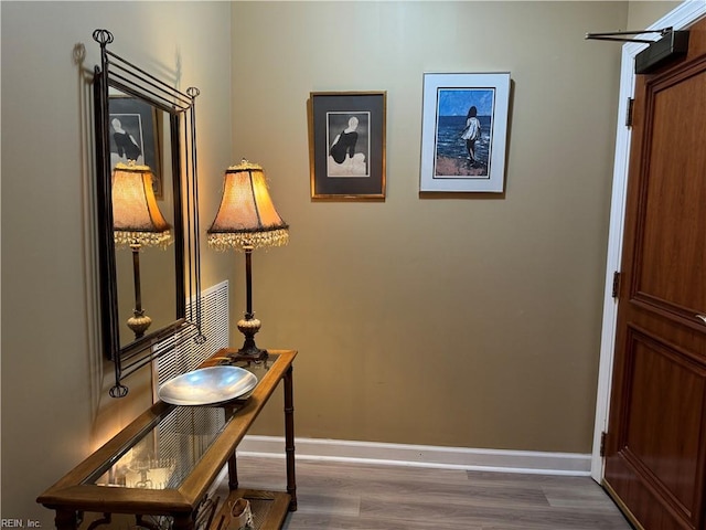 doorway featuring dark hardwood / wood-style flooring