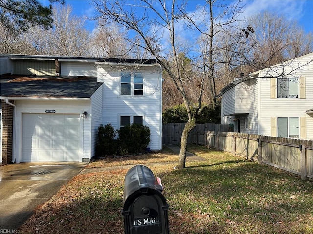 view of property exterior featuring a garage and a lawn