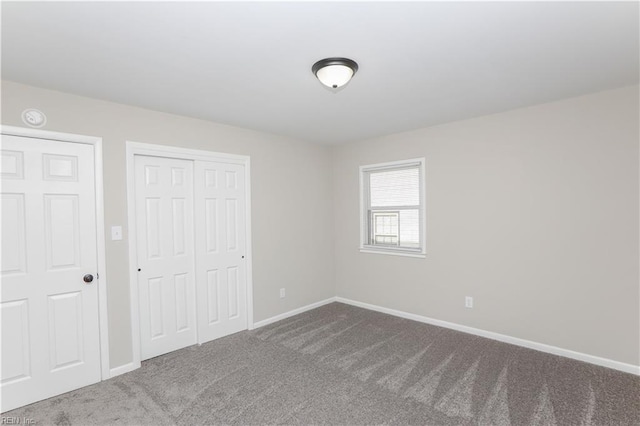 unfurnished bedroom with carpet flooring